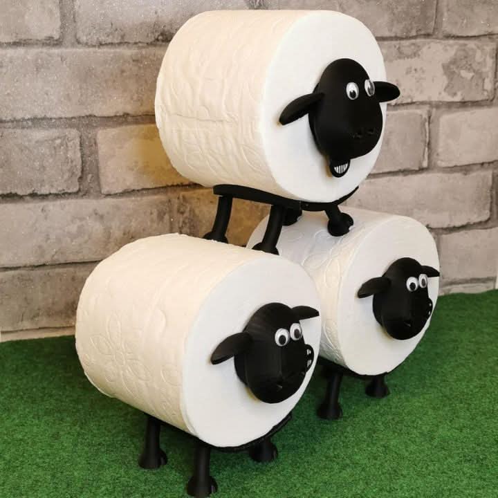 Toalettpapirholder i form av en sau 