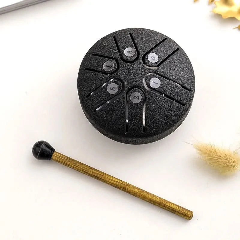 Mini tambor relajante con sonidos apacibles integrados 