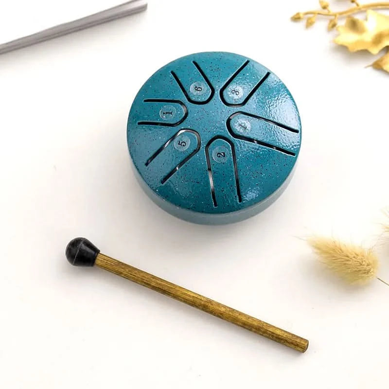 Mini tambor relajante con sonidos apacibles integrados 